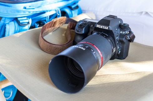 The Pentax K3 APS-C DSLR with Pentax tele-zoom attached.